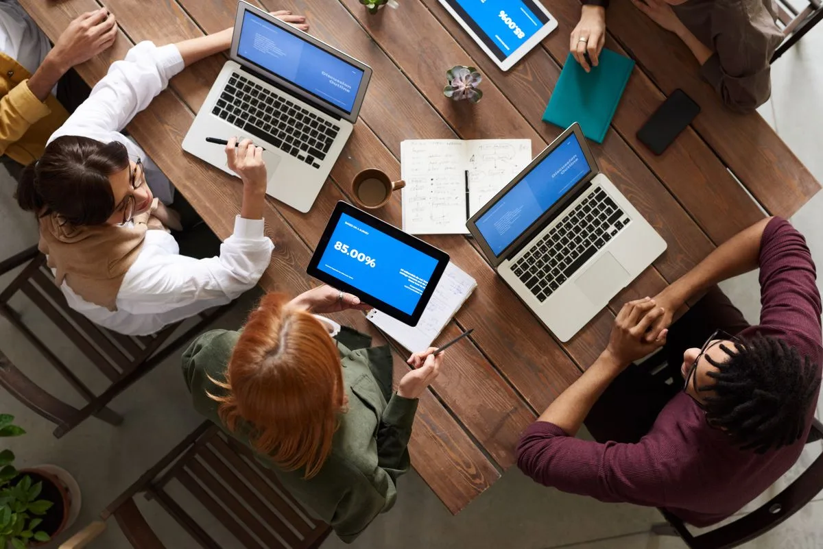 Cirreo team reviewing an evaluation dashboard with a client