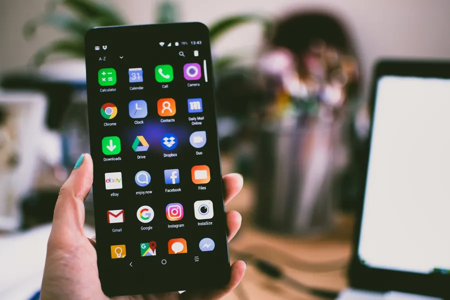 Person using a grocery delivery app on a phone
