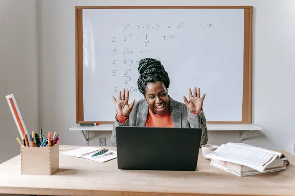 Instructor running a class on a laptop